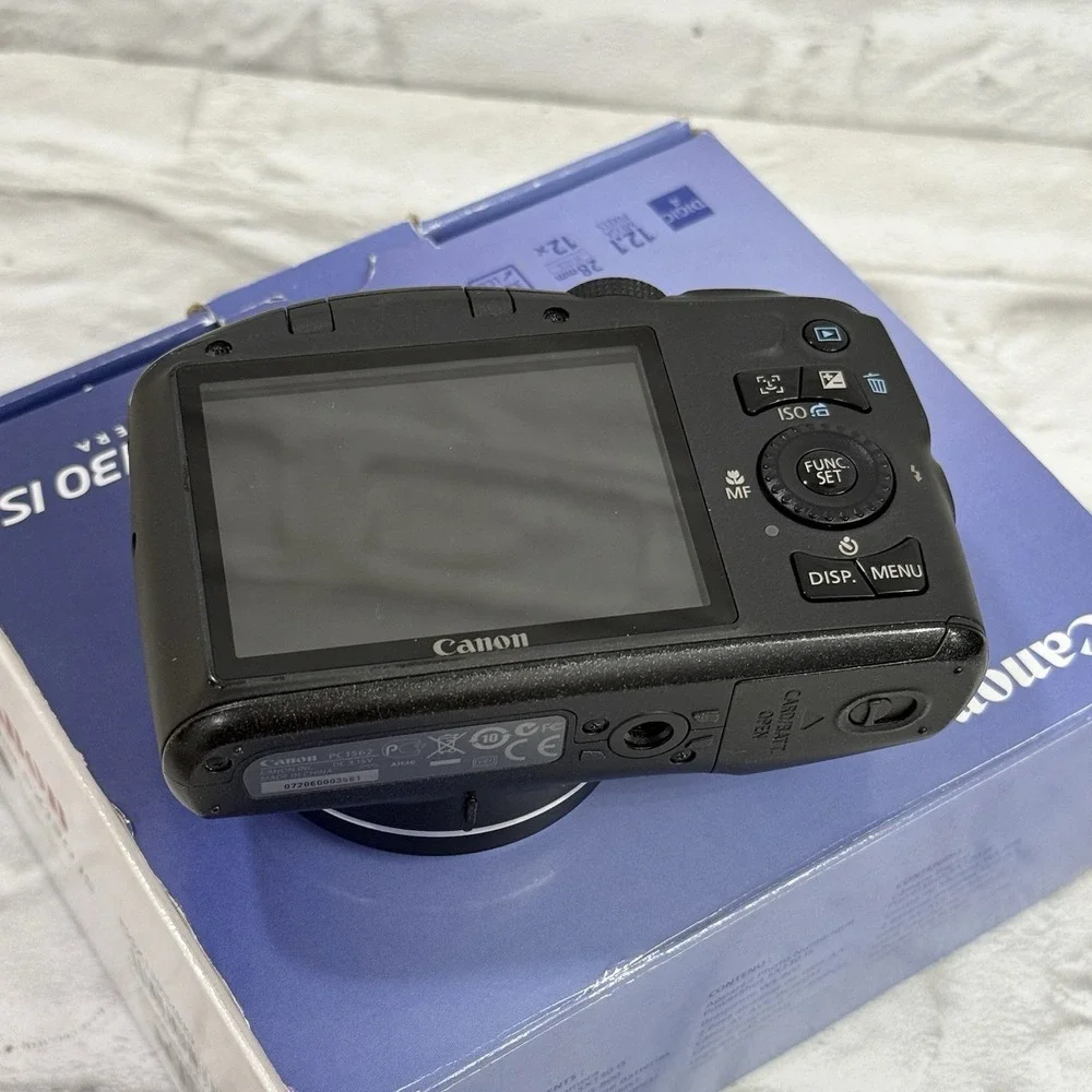 Canon SX130 IS Powershot Digital Camera 12x Optical Zoom 12.1 MP Black Excellent